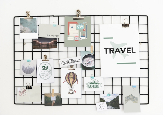 Travel and lifestyle postcard set on a rack