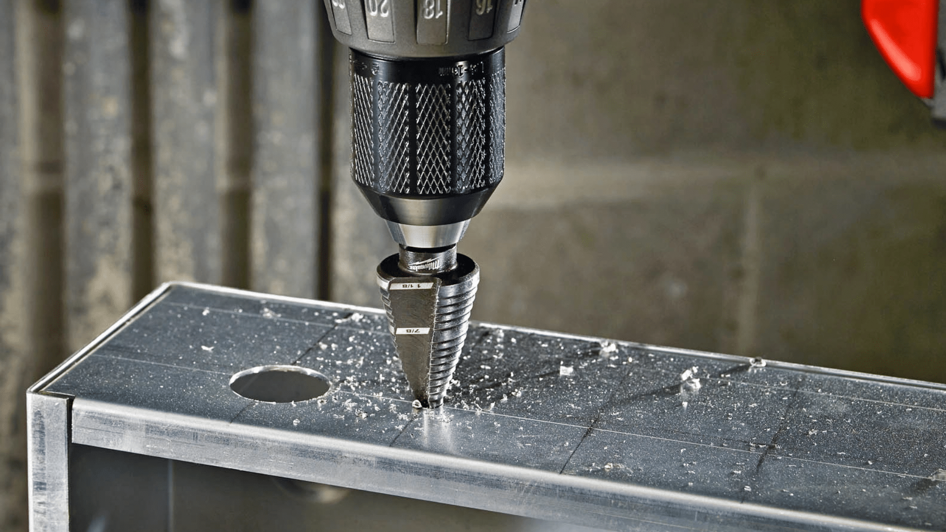 how to use a step drill bit