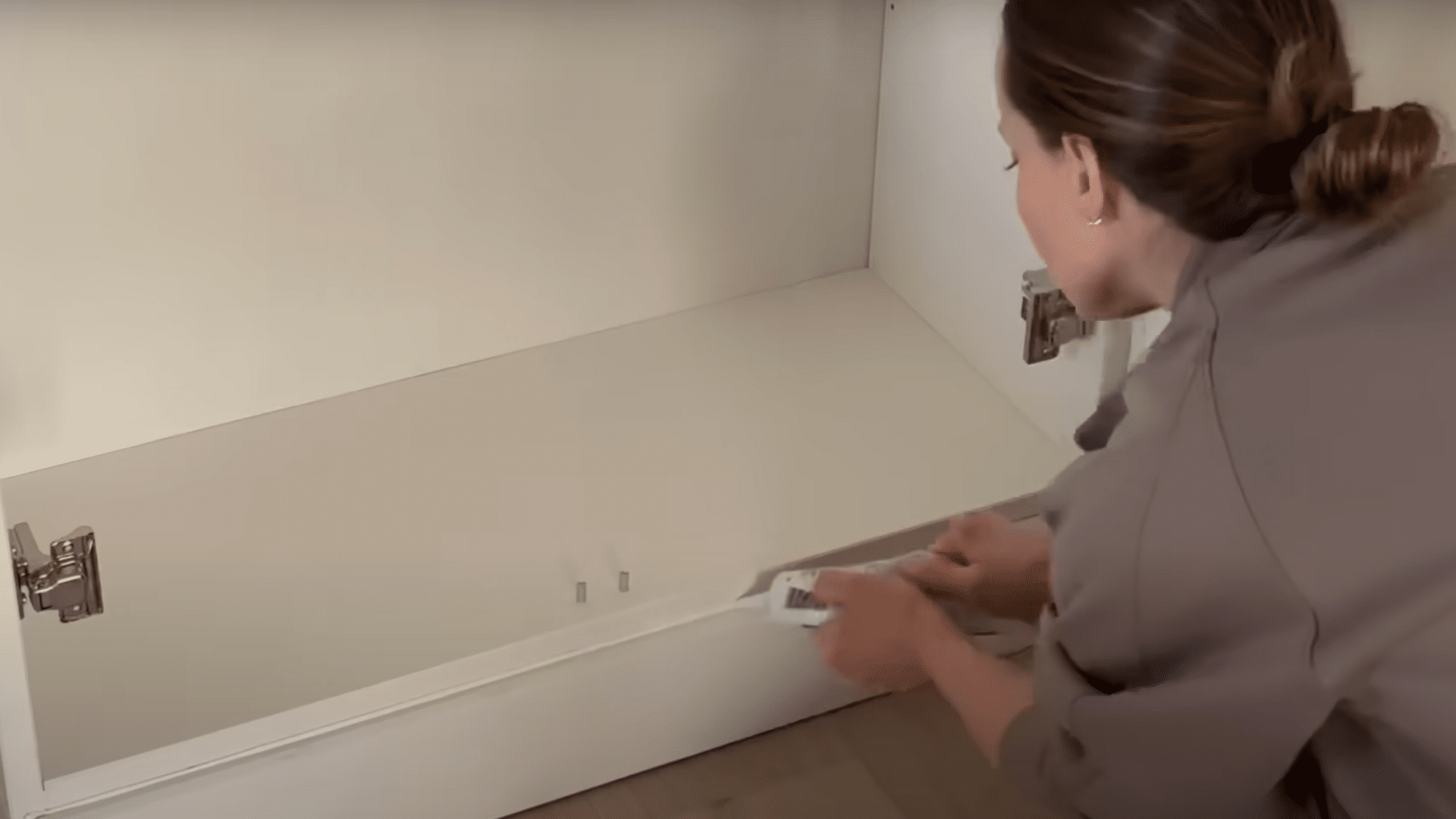 Now_its_time_to_make_it_look_custom_Fill_those_awkward_spaces_with_molding_and_trim_to_elevate_your_cabinet_wall_to_a_designer_look