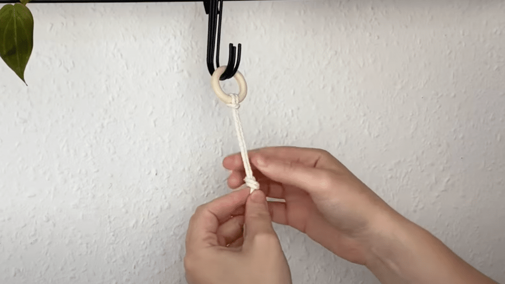 Step 2- Add a Simple Knot Below the Hoop