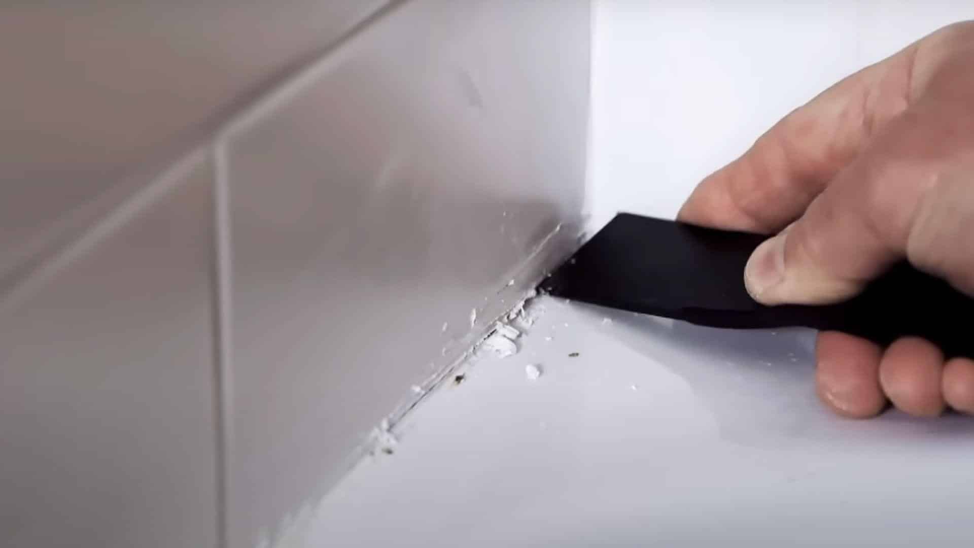 Step_2_Loosen_and_Pull_out_The_Caulk