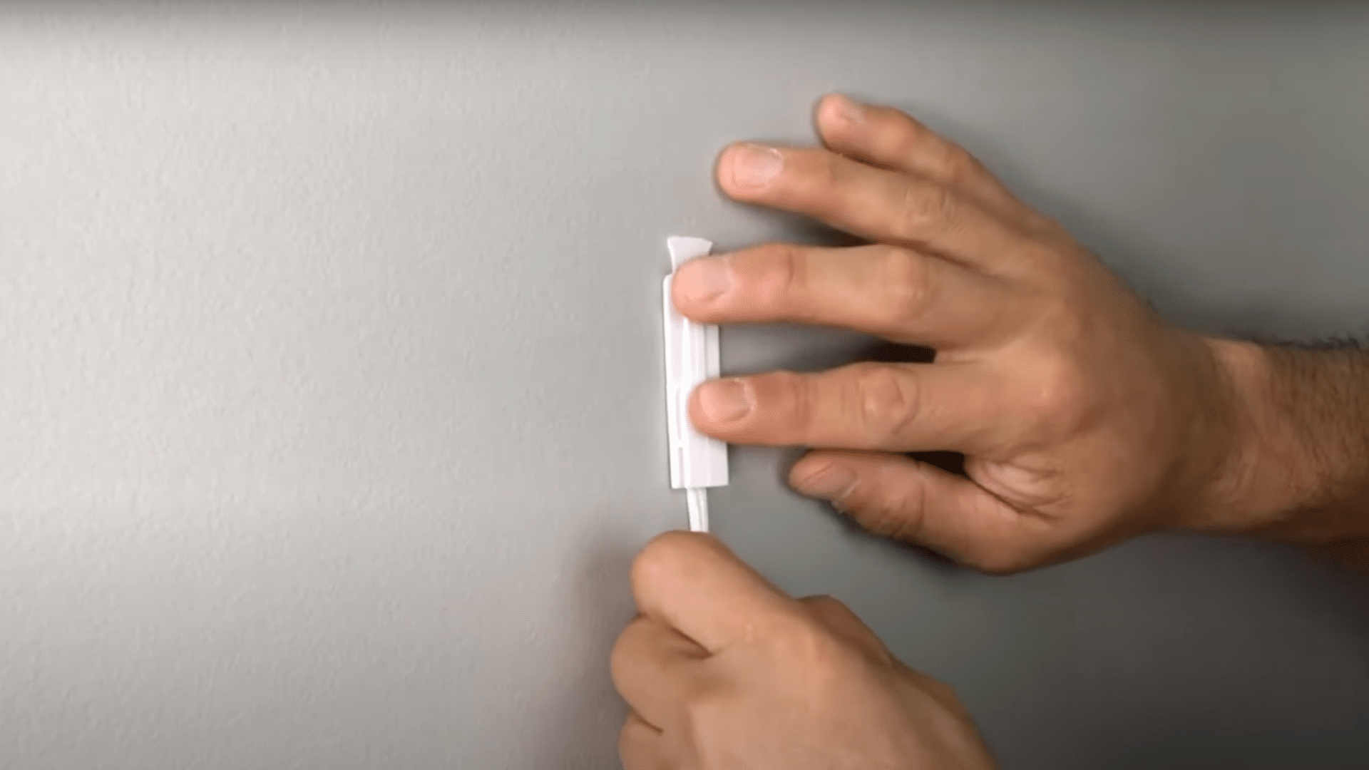 How to Remove Command Strips Without Damaging Your Walls - HelpWithDIY