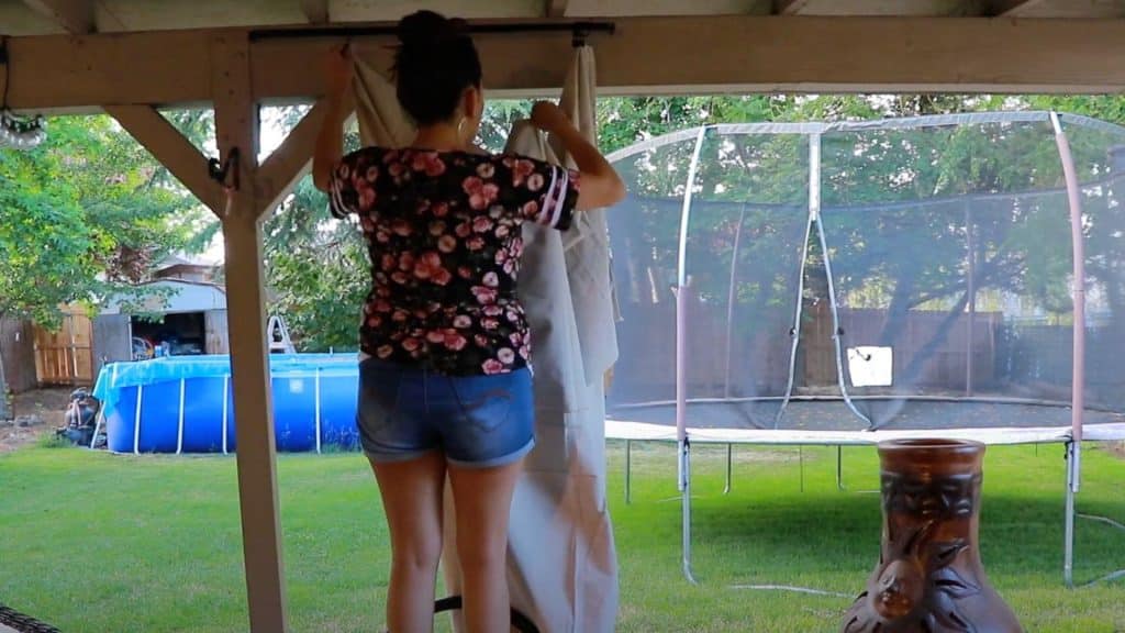 Hang Curtains and Adjust for Proper Coverage