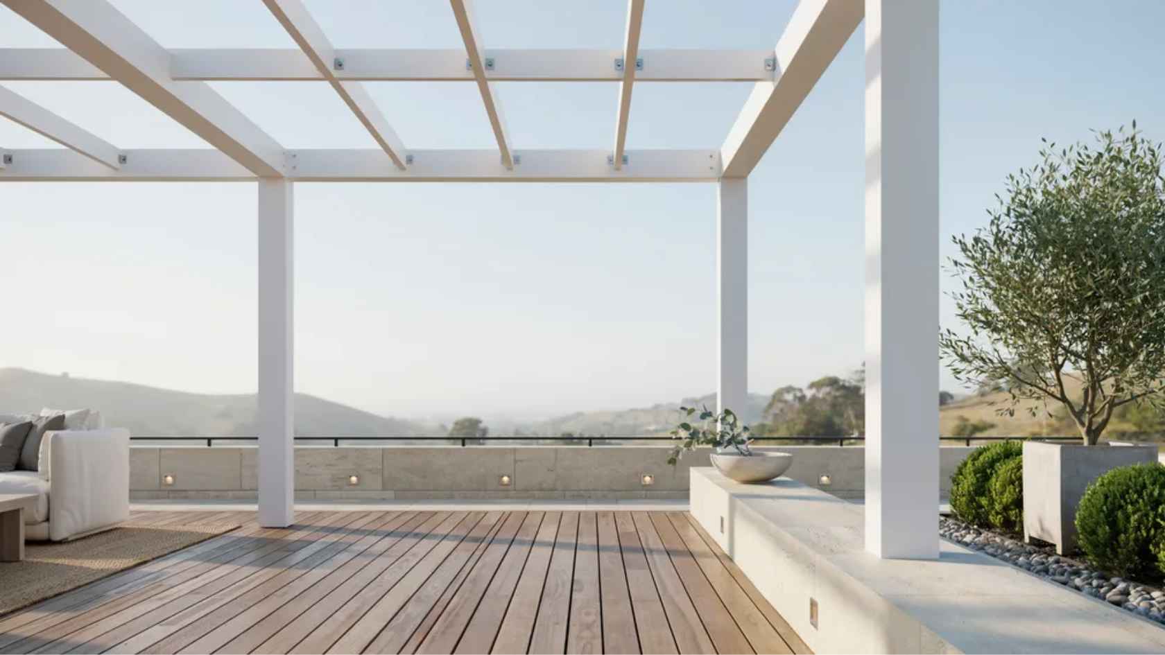 Low-maintenance fiberglass pergola with durable white beams in a modern backyard setting