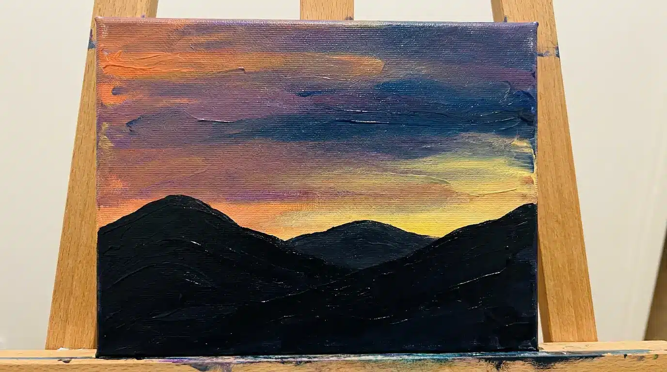 Mini mountain range canvas painting with sunset sky and silhouettes