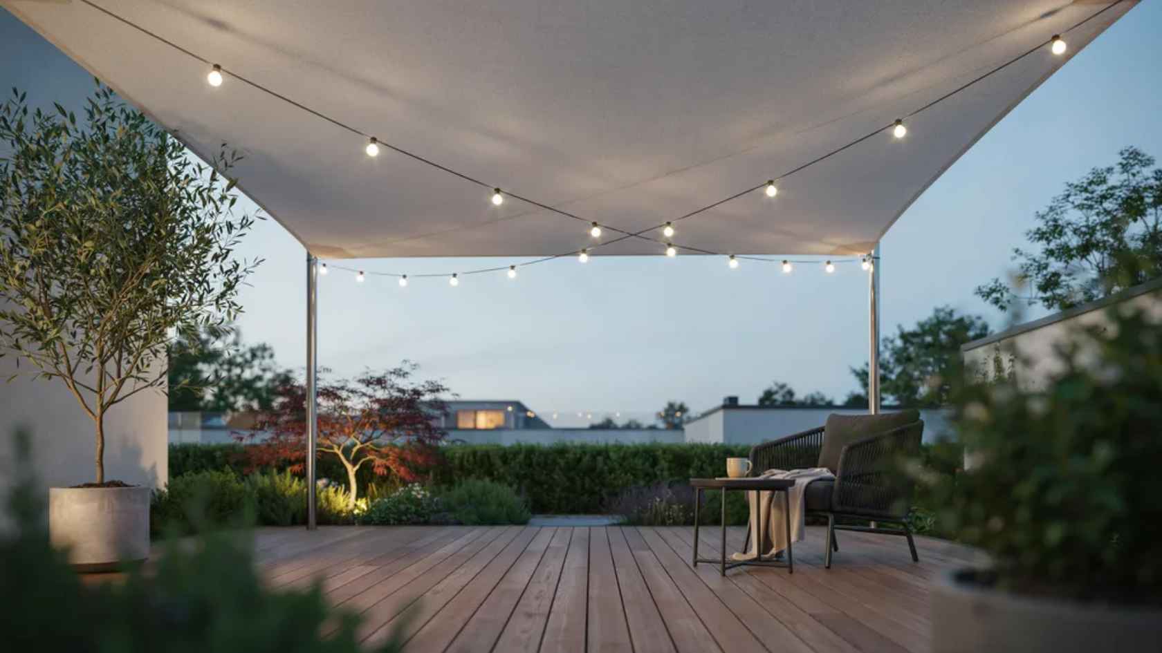 Solar-powered LED canopy lights glowing above a shade structure on a backyard deck