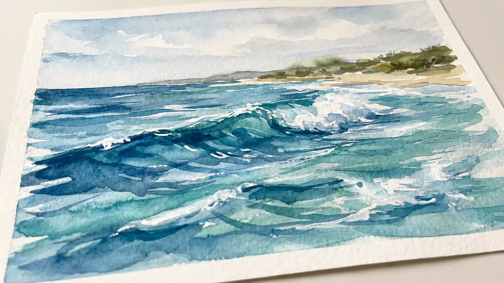 Watercolor ocean waves with white foam on blue-green water