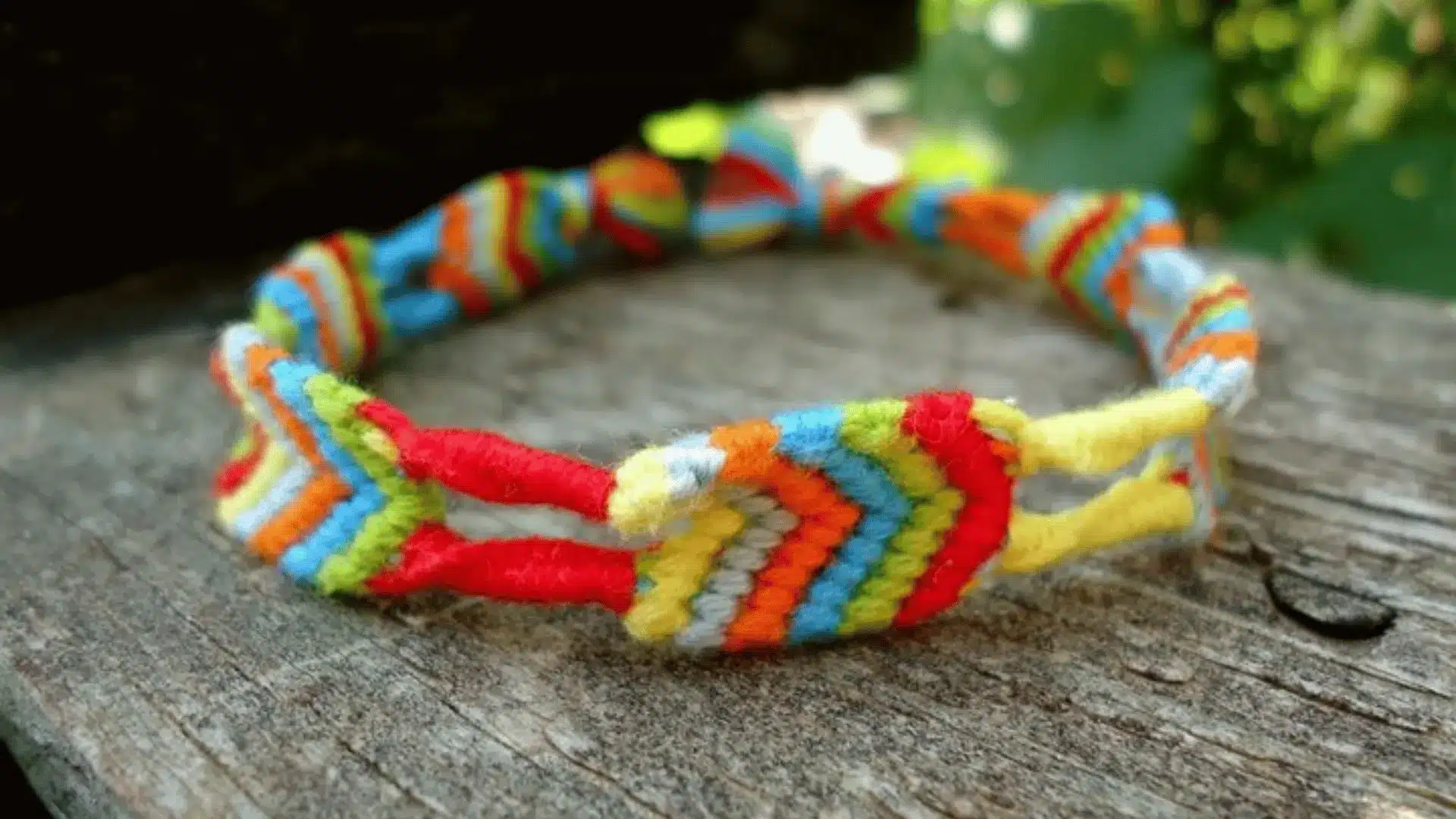 Broken ladder friendship bracelet with twisted ladder-style pattern.