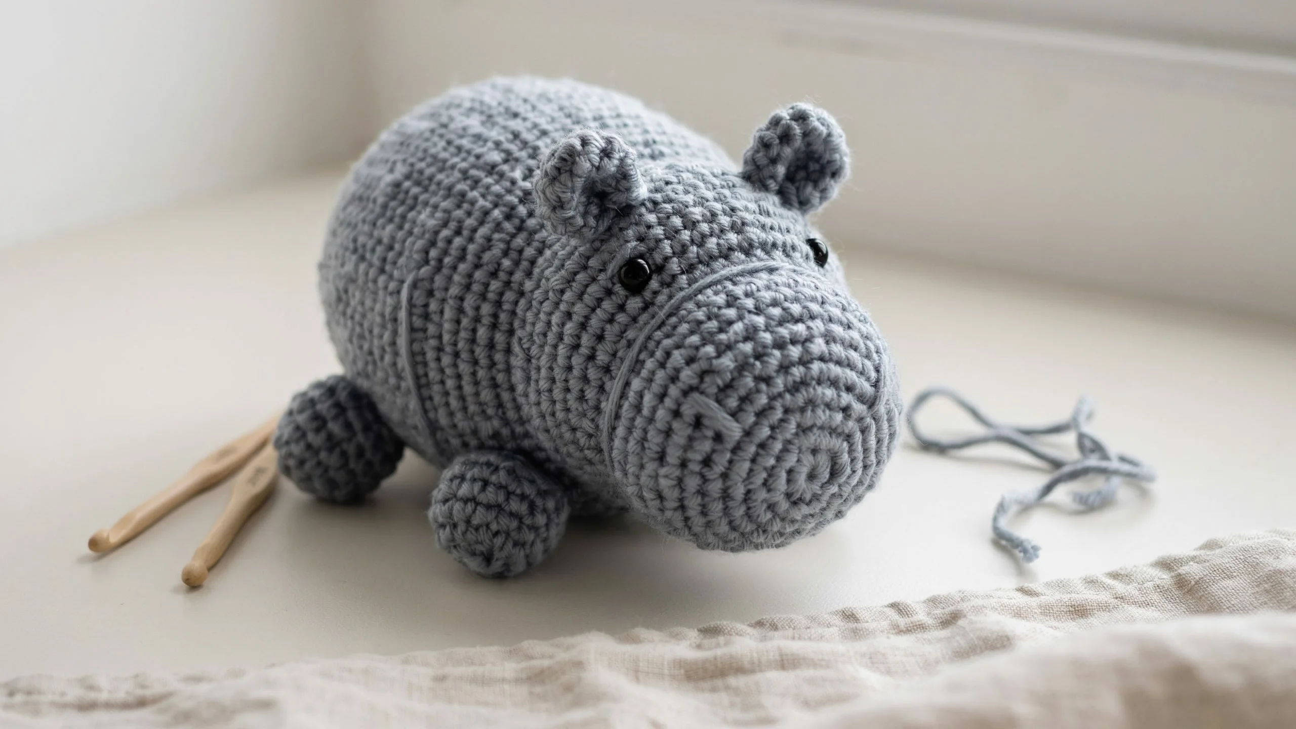Crochet hippo with wide body and flat muzzle centered