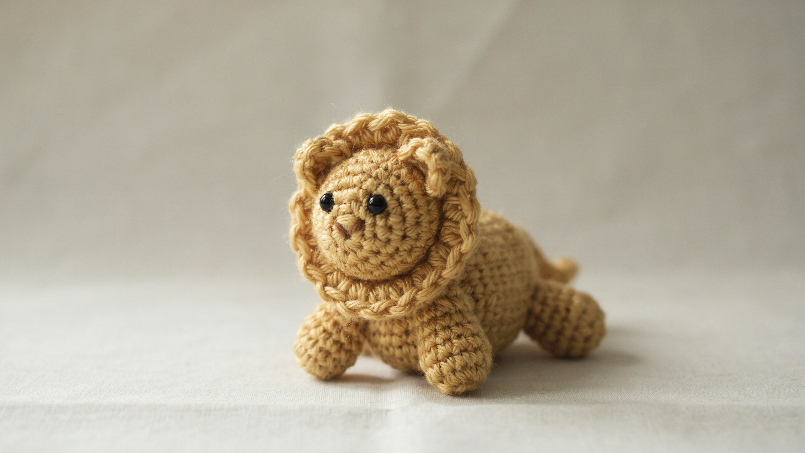 Crochet lion with textured mane and round face centered
