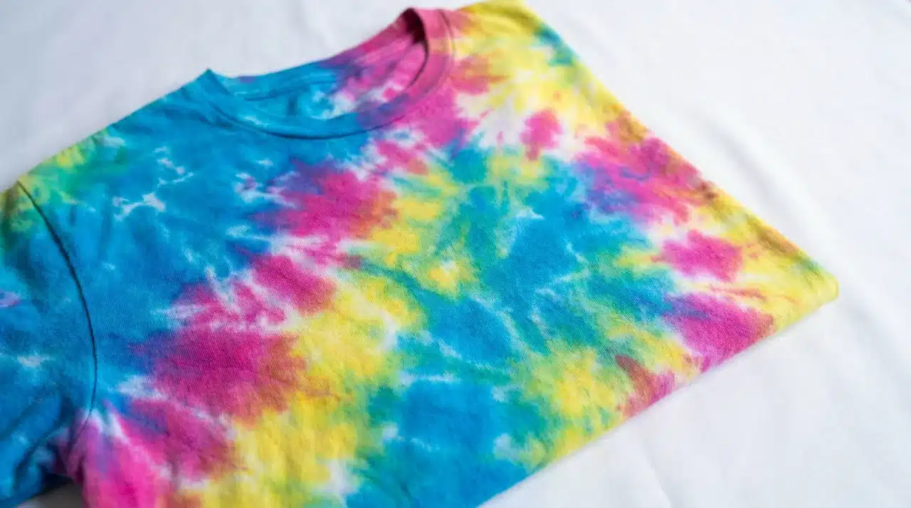 Pastel crumple tie dye shirt with soft blended colors and an organic abstract pattern