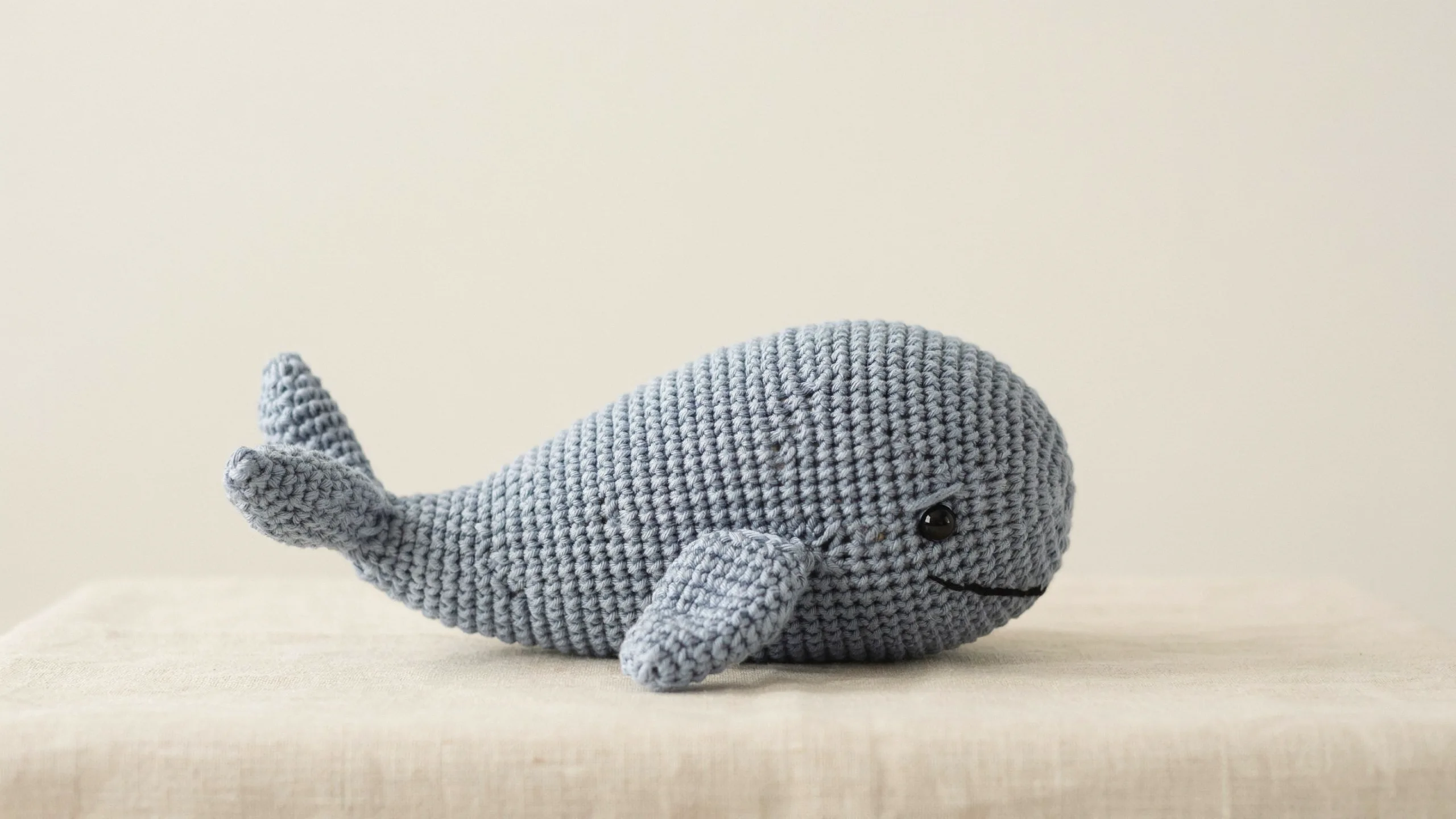Smooth crochet whale with flat underside and small tail fin centered